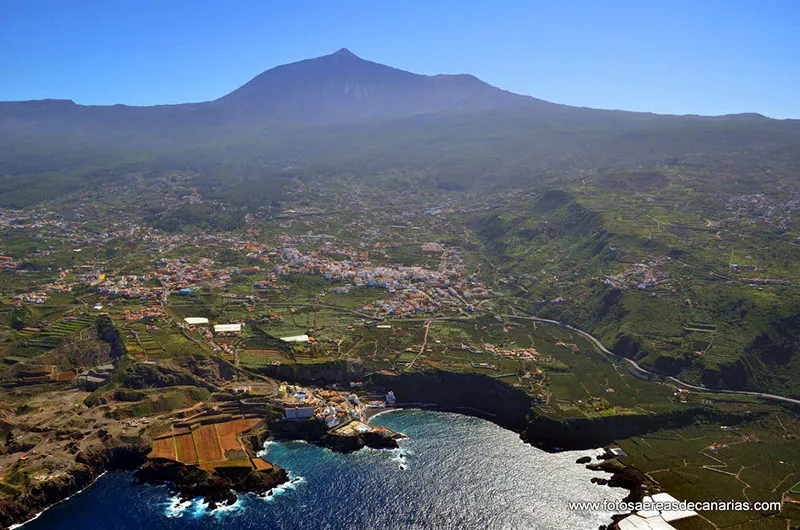 Aerial view of Icod de los Vinos and the coast, with Mount Teide in the background