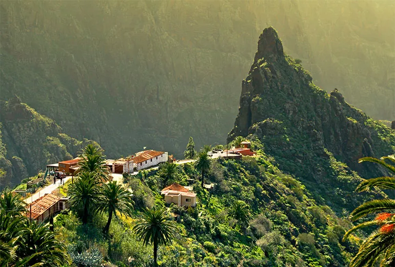 The village of Masca on a spur among palms, ravines and the rocky peaks of Teno
