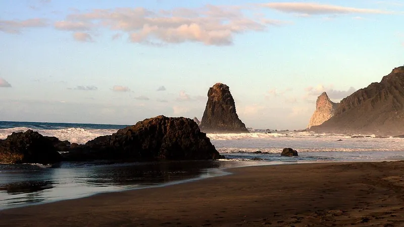 Black sand and sea stacks of Playa Benijo, at the foot of the Anaga mountains